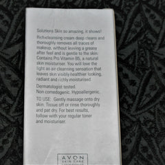 Avon skin care product box, white with black text, on patterned background.