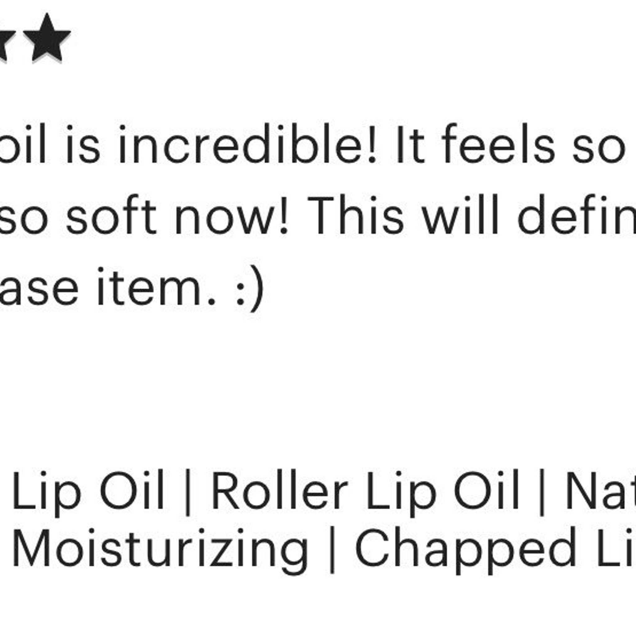 Lip Oil review with black text and white background, includes stars and a smiley face