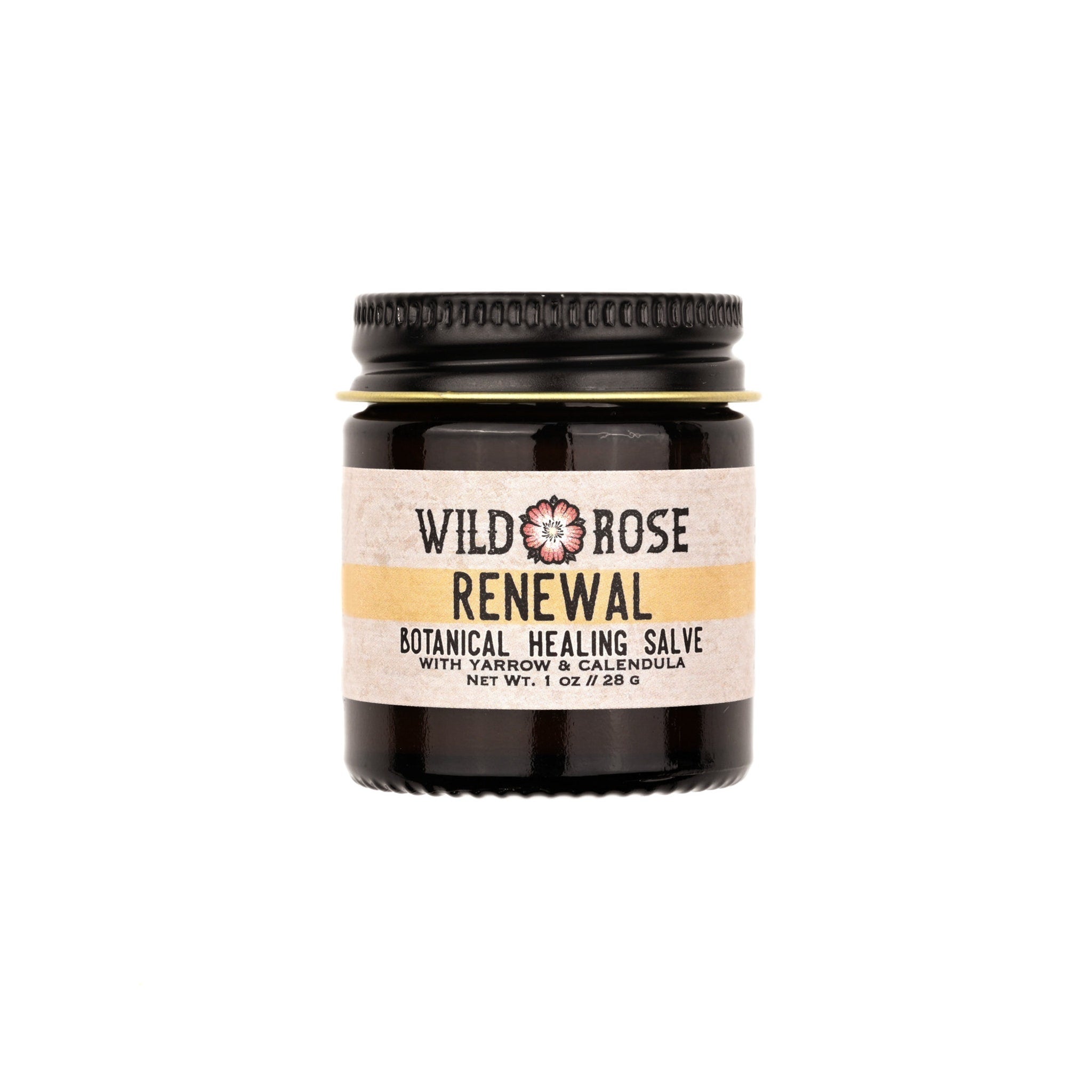 Healing salve jar with black lid, brown glass, and Wild Rose label