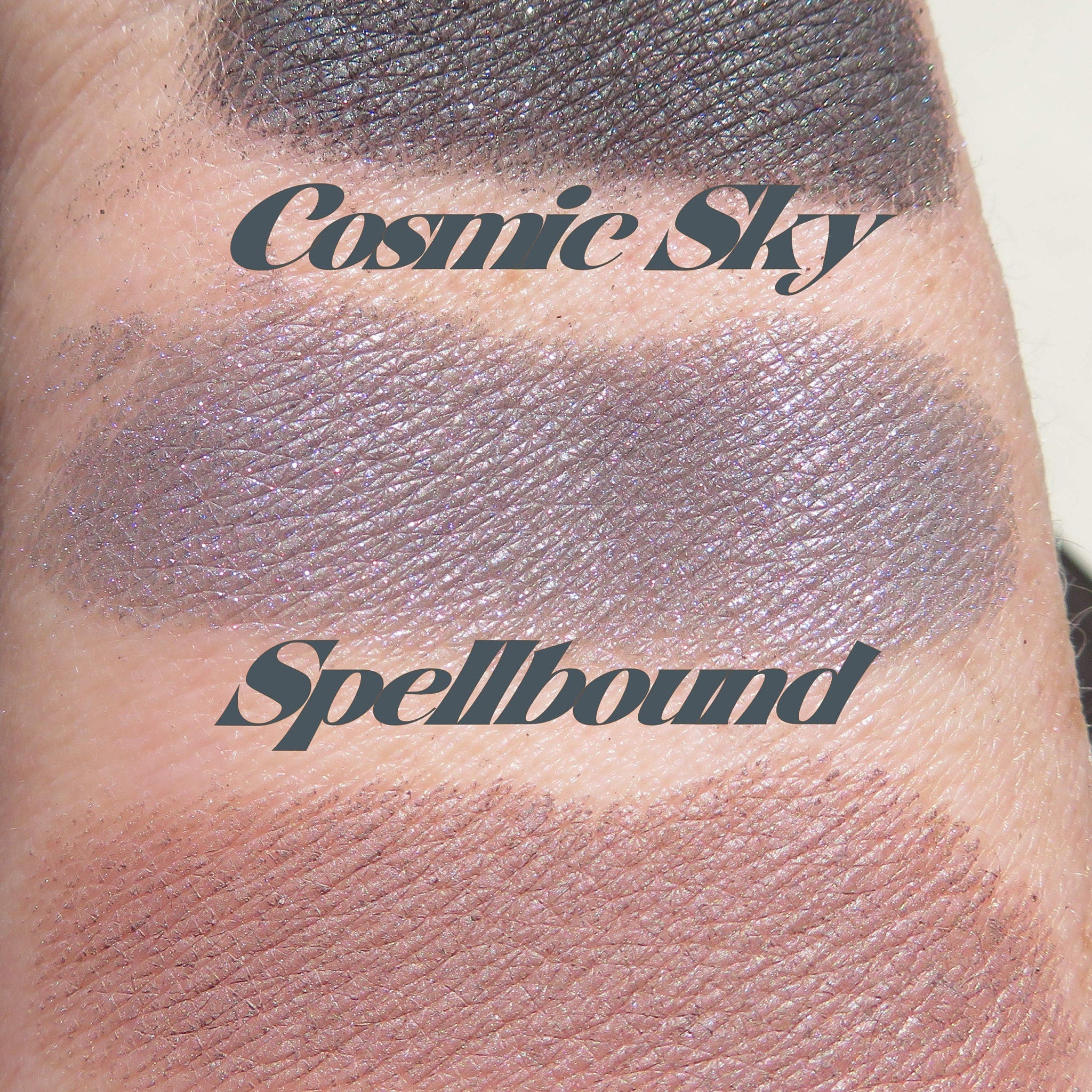 Close-up of black shimmer loose mineral eyeshadow with sparkling cosmic particles in jar