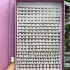 Promade lash trays, black synthetic lashes, arranged in rows, with length indicators