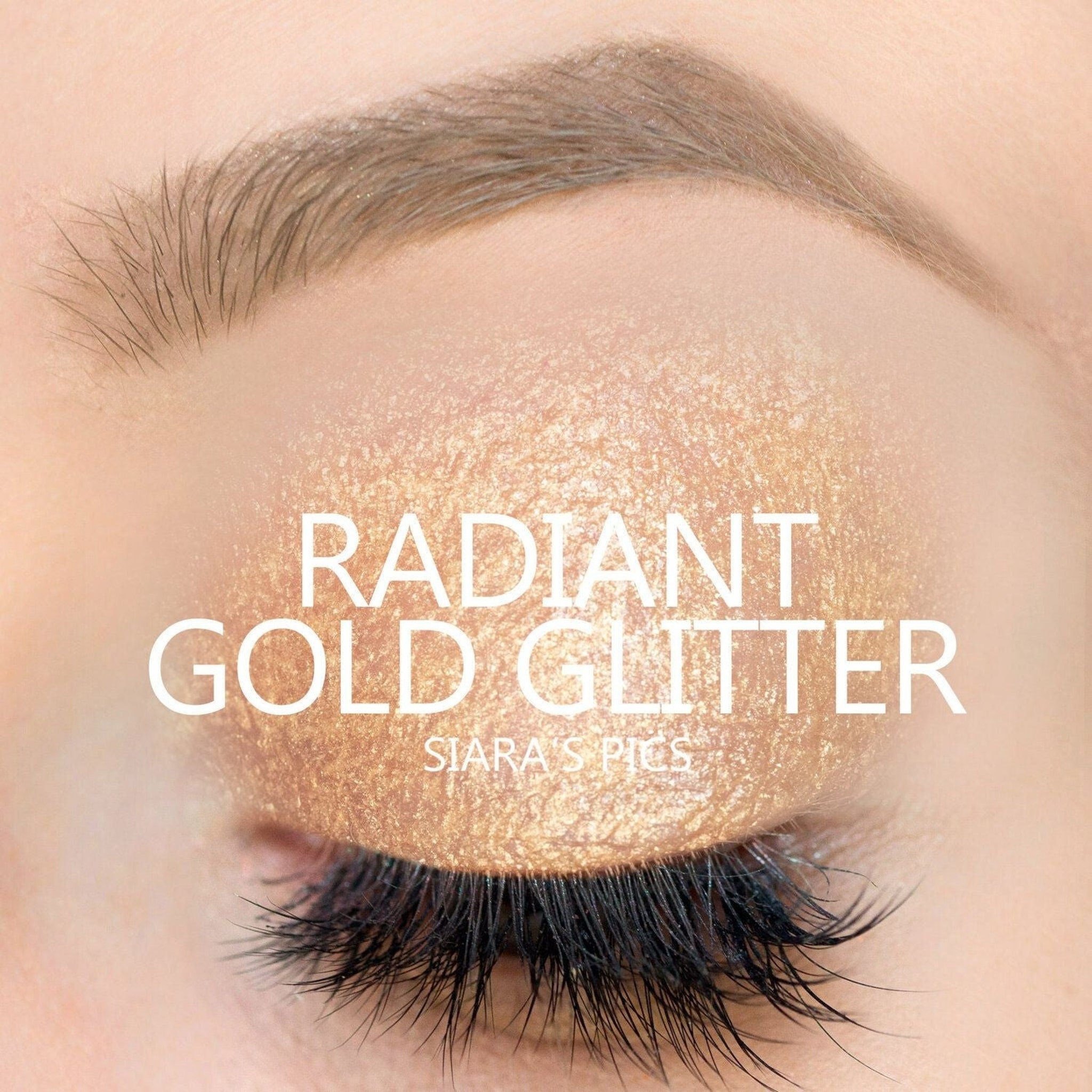 Side view of radiant gold glitter eyeshadow pot showing creamy powder texture and reflective shimmer particles