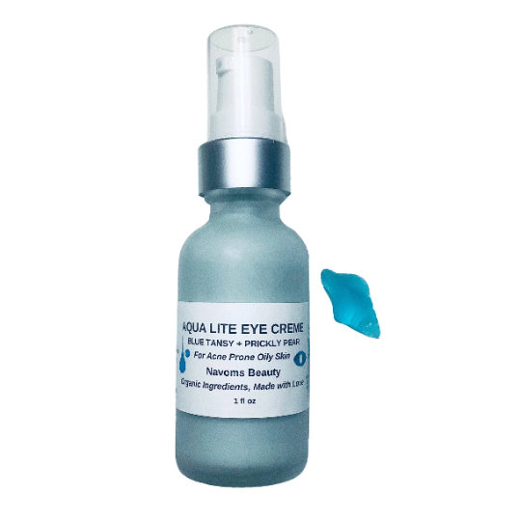Eye cream bottle with blue glass, silver cap, and Navoms Beauty label