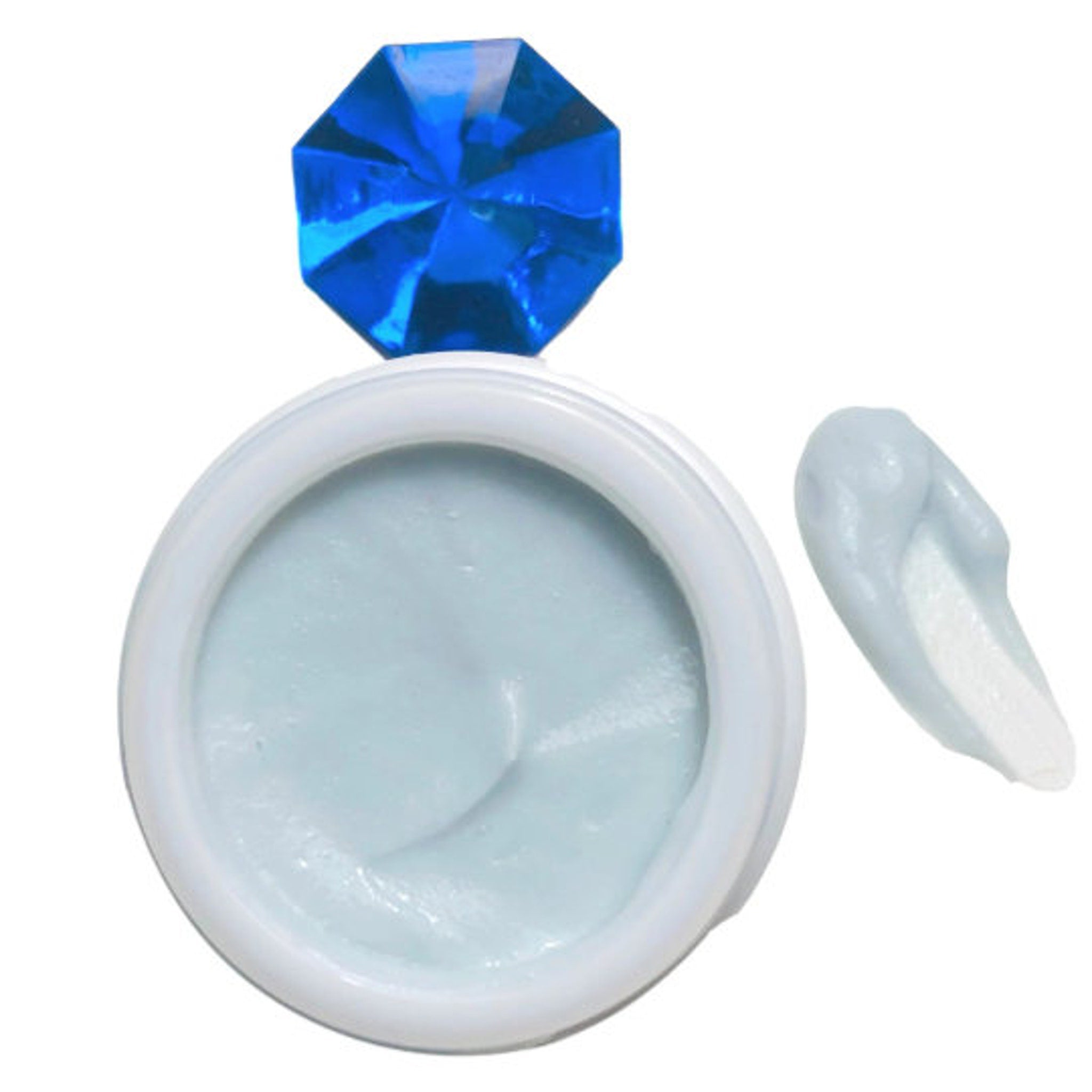 Cream jar with blue cream and blue gem, white container, light blue cream visible