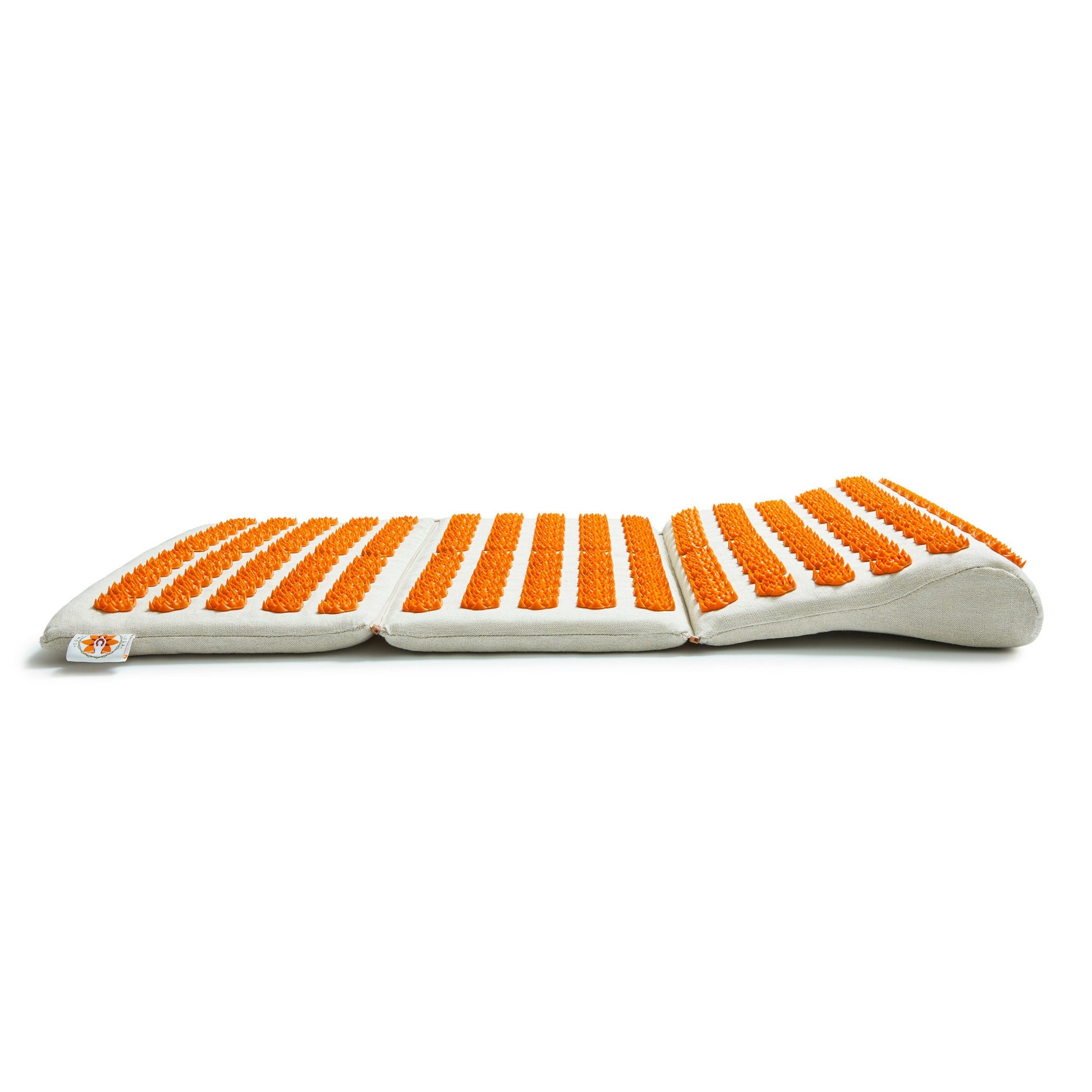 Acupressure mat with orange spikes on a light gray fabric base, for body use