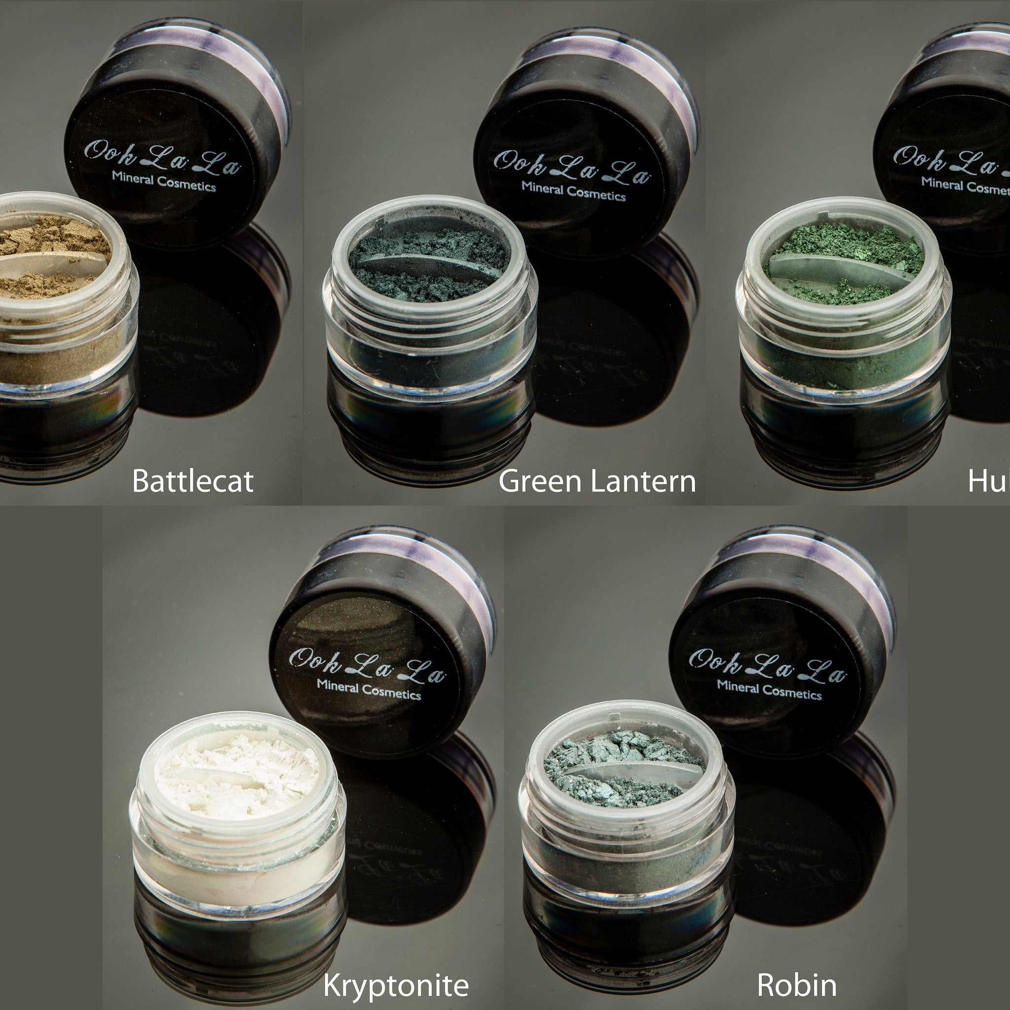 Side view of mineral eye shadow jar showing textured powder surface in natural earthy tones