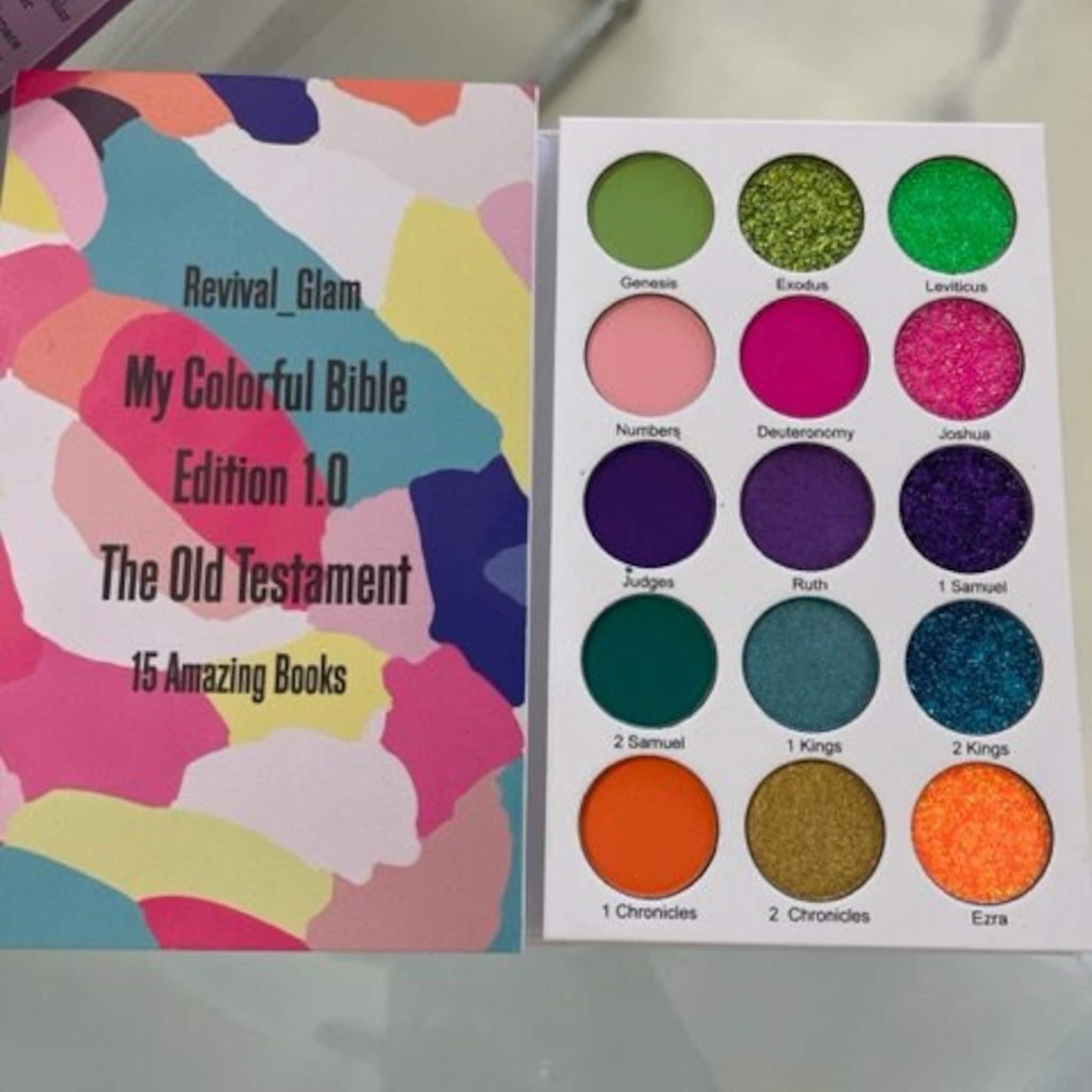 Eyeshadow palette with colorful shades, glitter, and Revival Glam branding on the cover.