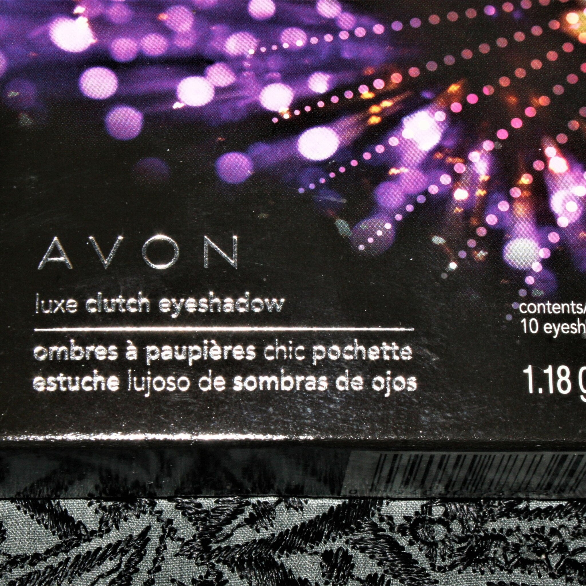 Vintage Avon eyeshadow compact showcasing bonus mirrored interior with gold detailing and dual applicators