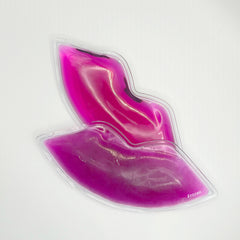 Lip-shaped gel pack in pink liquid, clear plastic, with "Frozen" text visible on the corner.