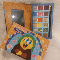 Pawfect Eyes on Me eyeshadow palette featuring 12 vibrant matte and shimmer shades in a sleek black compact