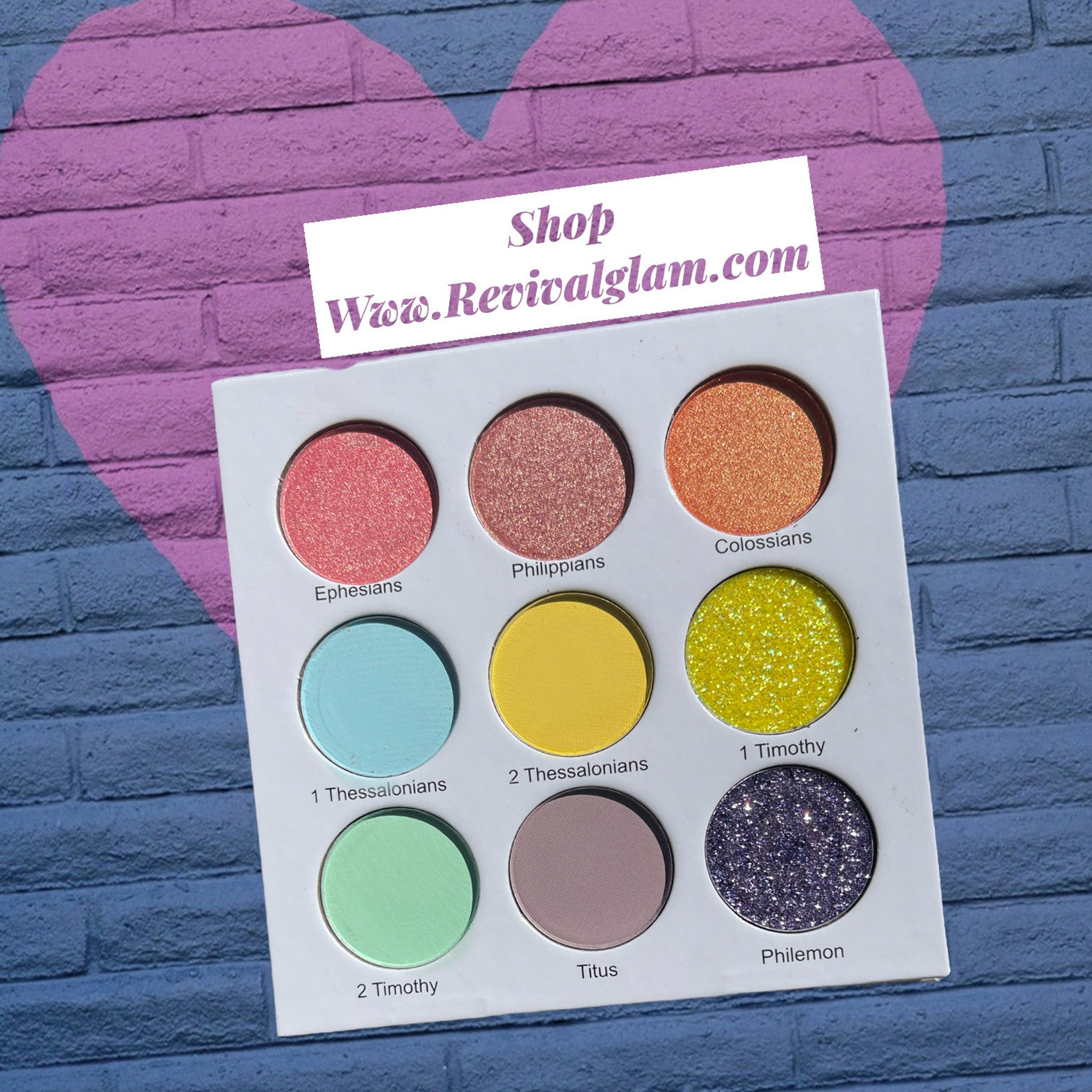 Open Colorful Bible Eye Shadow Palette showing 12 vibrant matte and shimmer shades in New Testament Edition 2.0 packaging