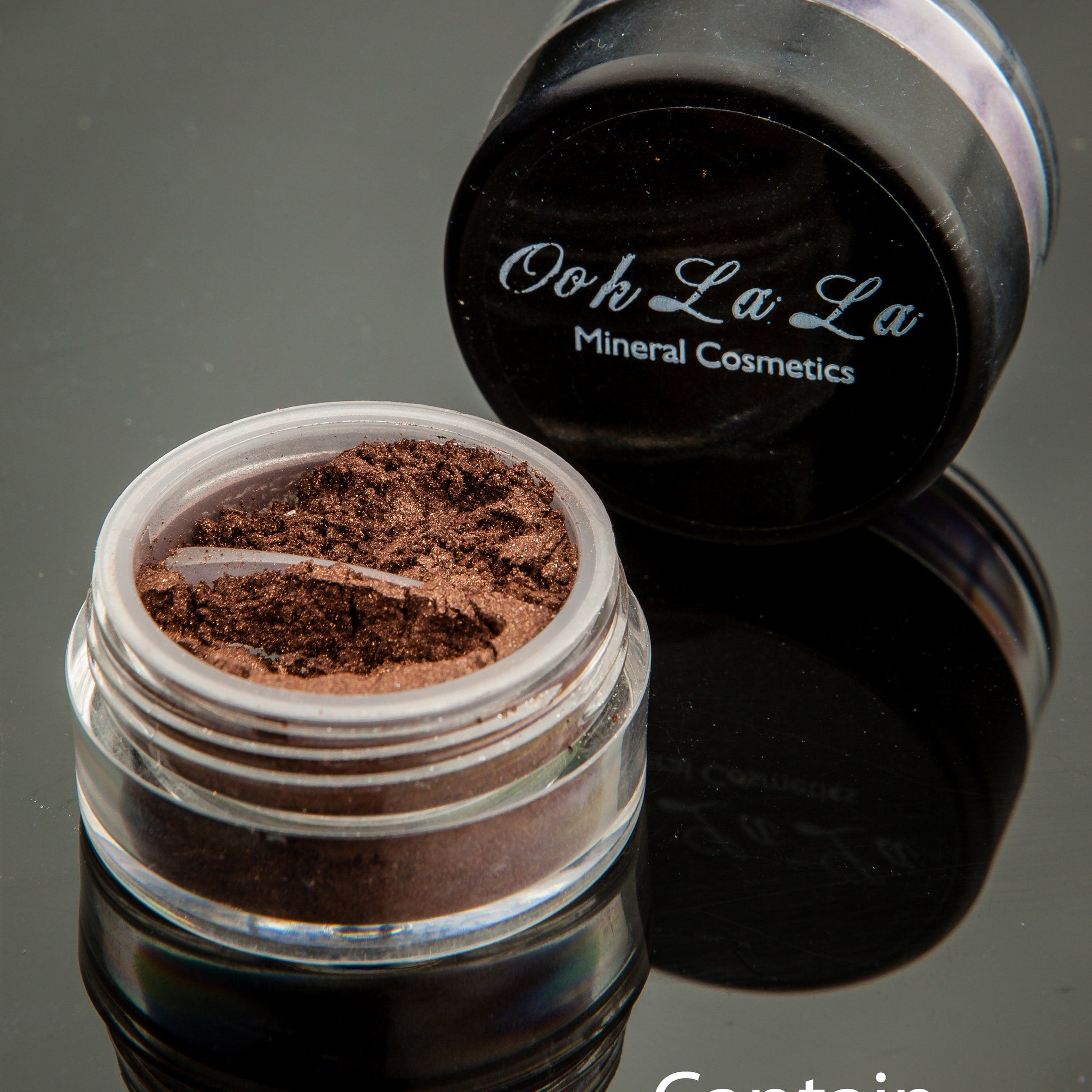 Side view of brown and neutral vegan mineral eye shadow in a round 10g jar with matte finish