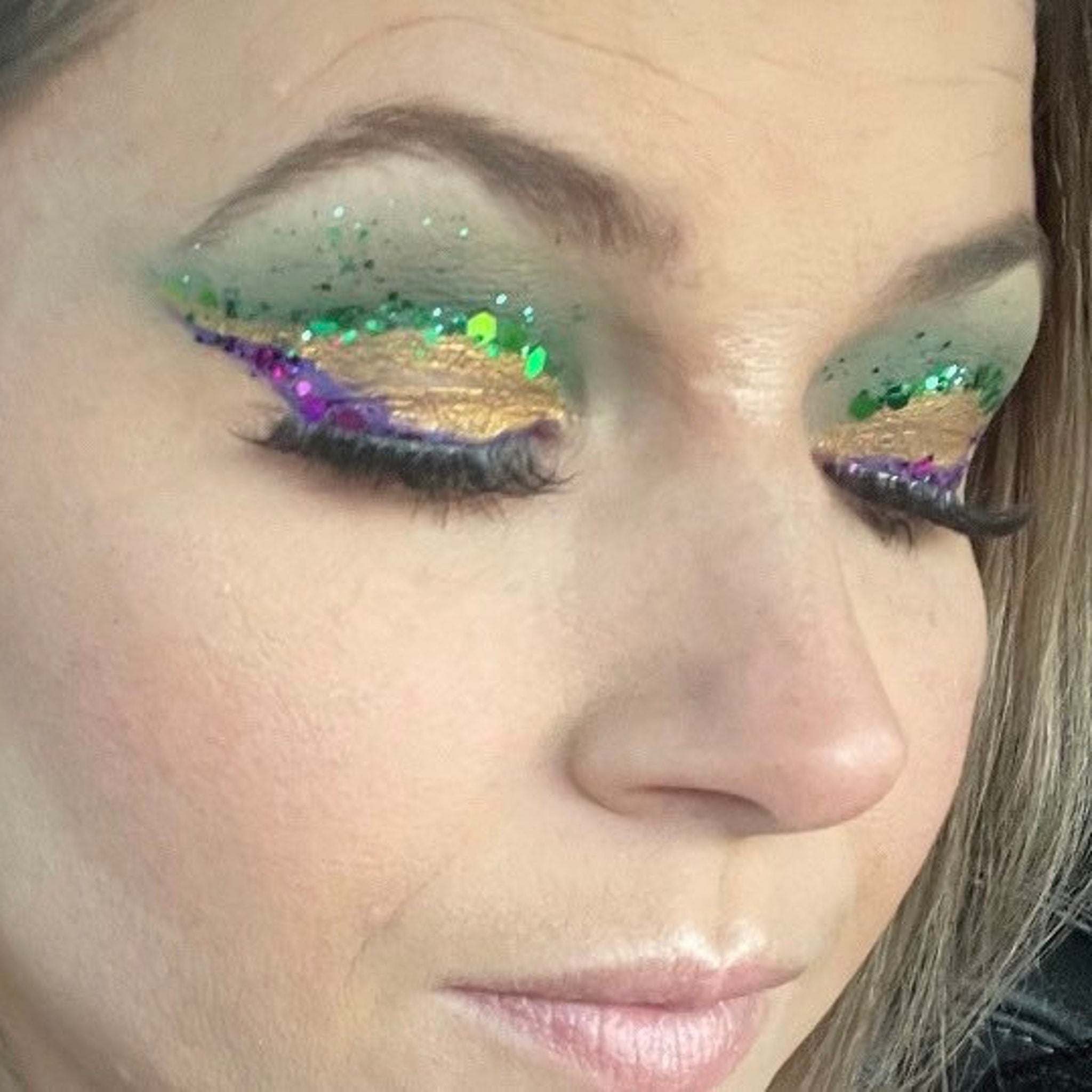 Close-up of chunky purple glitter with holographic flecks in Mardi Gras Glitter Kit