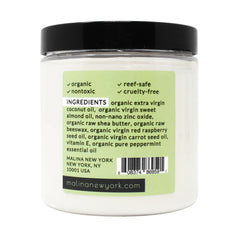 Jar of white cream with black lid and green label, MALINA NEW YORK branding visible