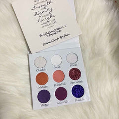 Side view of Colorful Bible Eyeshadow Palette showing 12 vibrant shades in matte and shimmer finishes with Old Testament theme