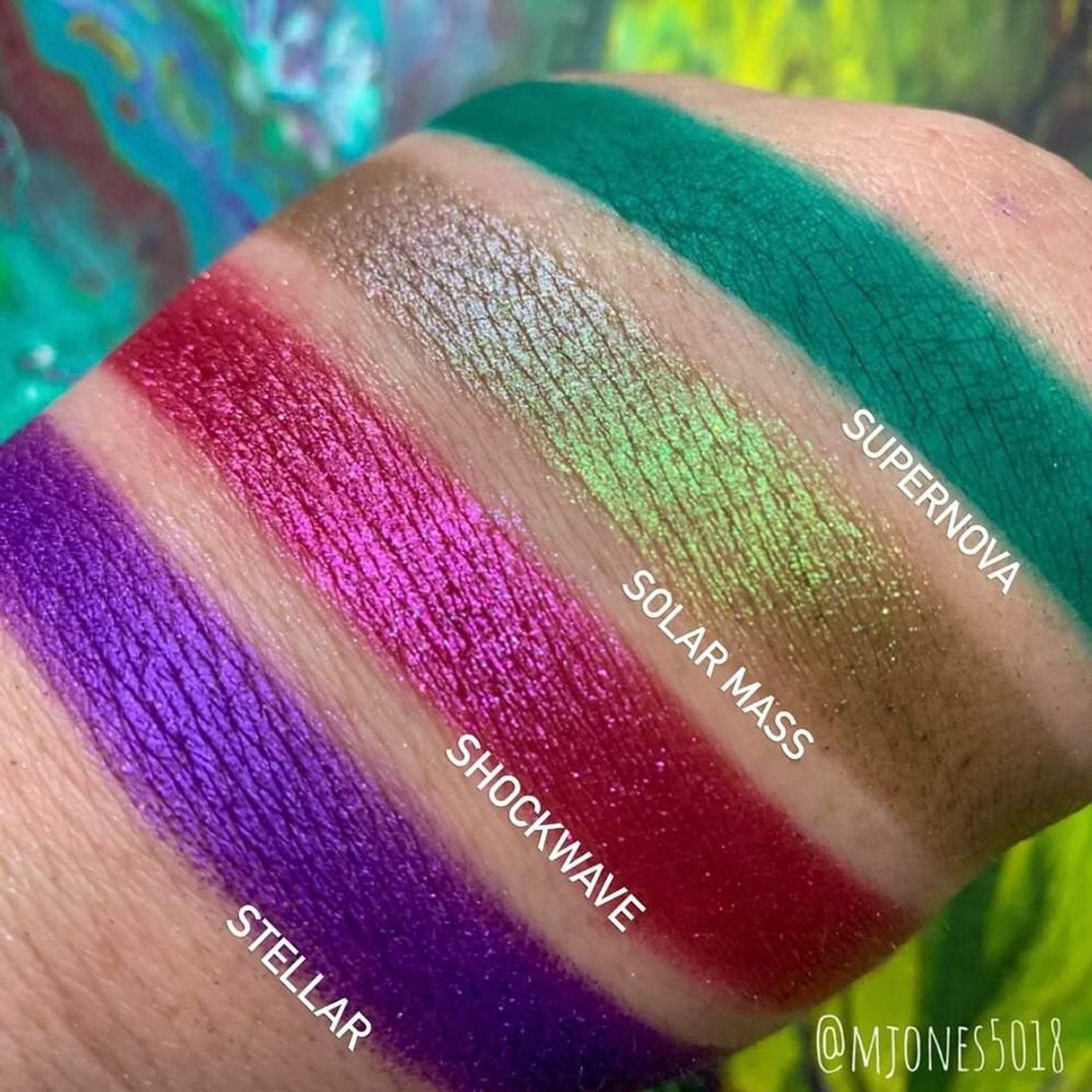 Side view of Cosmic Bubbles Eyeshadow Palette showing vibrant color gradient from pink to purple shades
