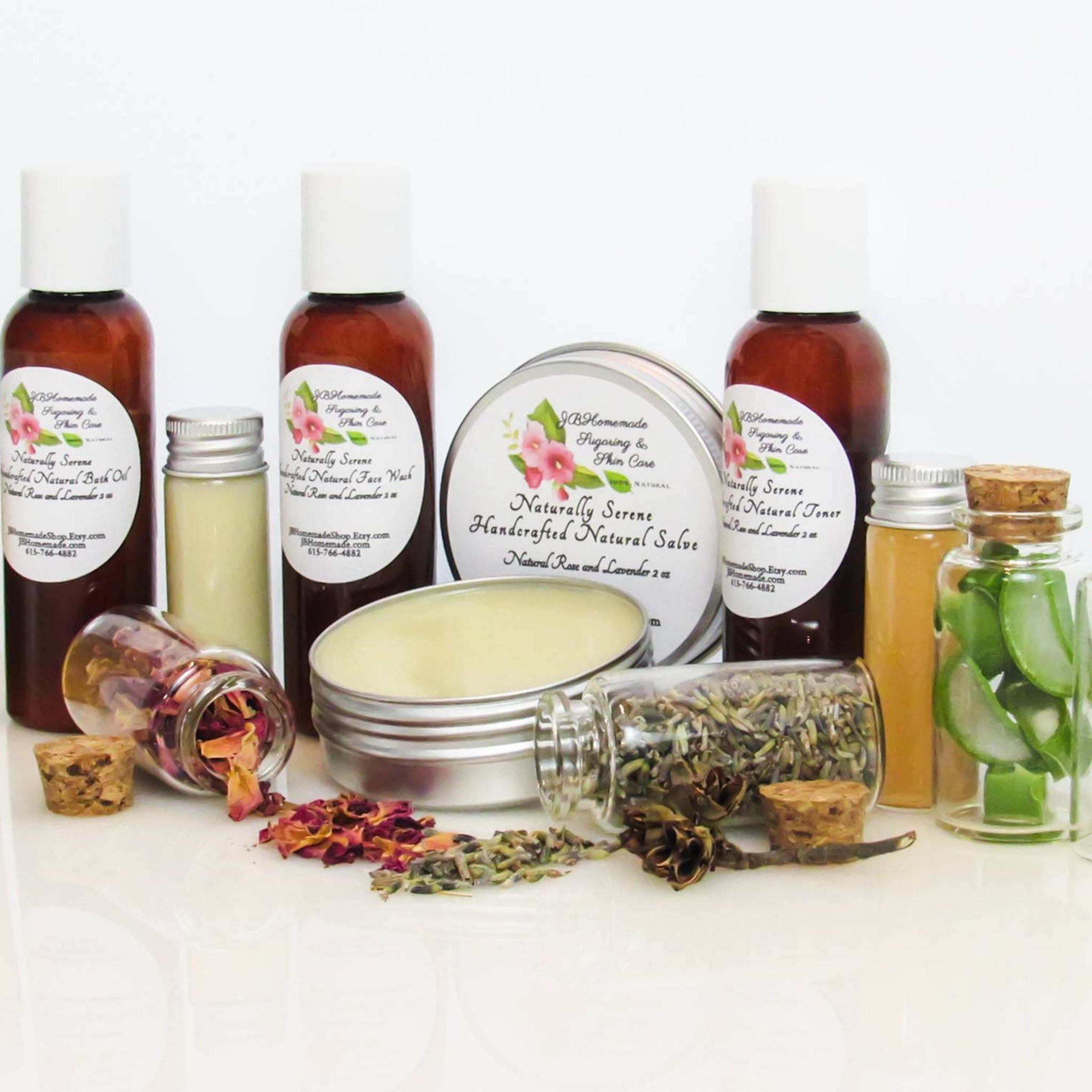 Skincare products in brown bottles with white labels, various glass jars, and floral accents, JBHomemade brand