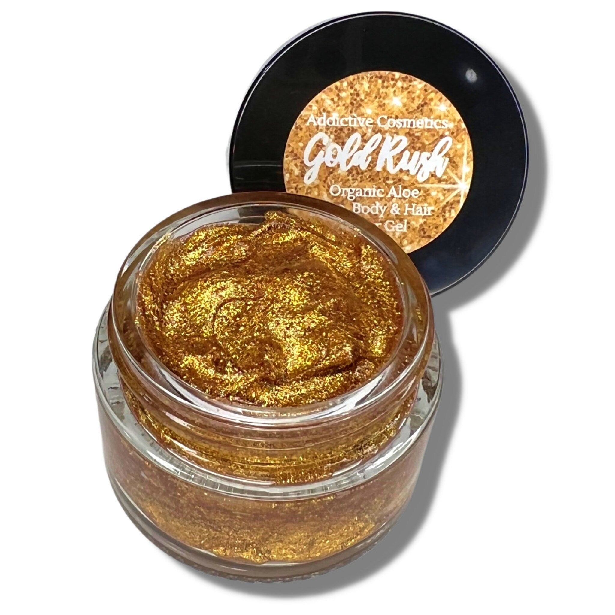 Side view of gold glitter gel pot showing creamy texture and reflective shimmer in clear jar