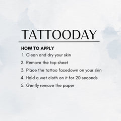 Close-up of a temporary tattoo UFO set being applied to clean, moisturized skin with fingertips
