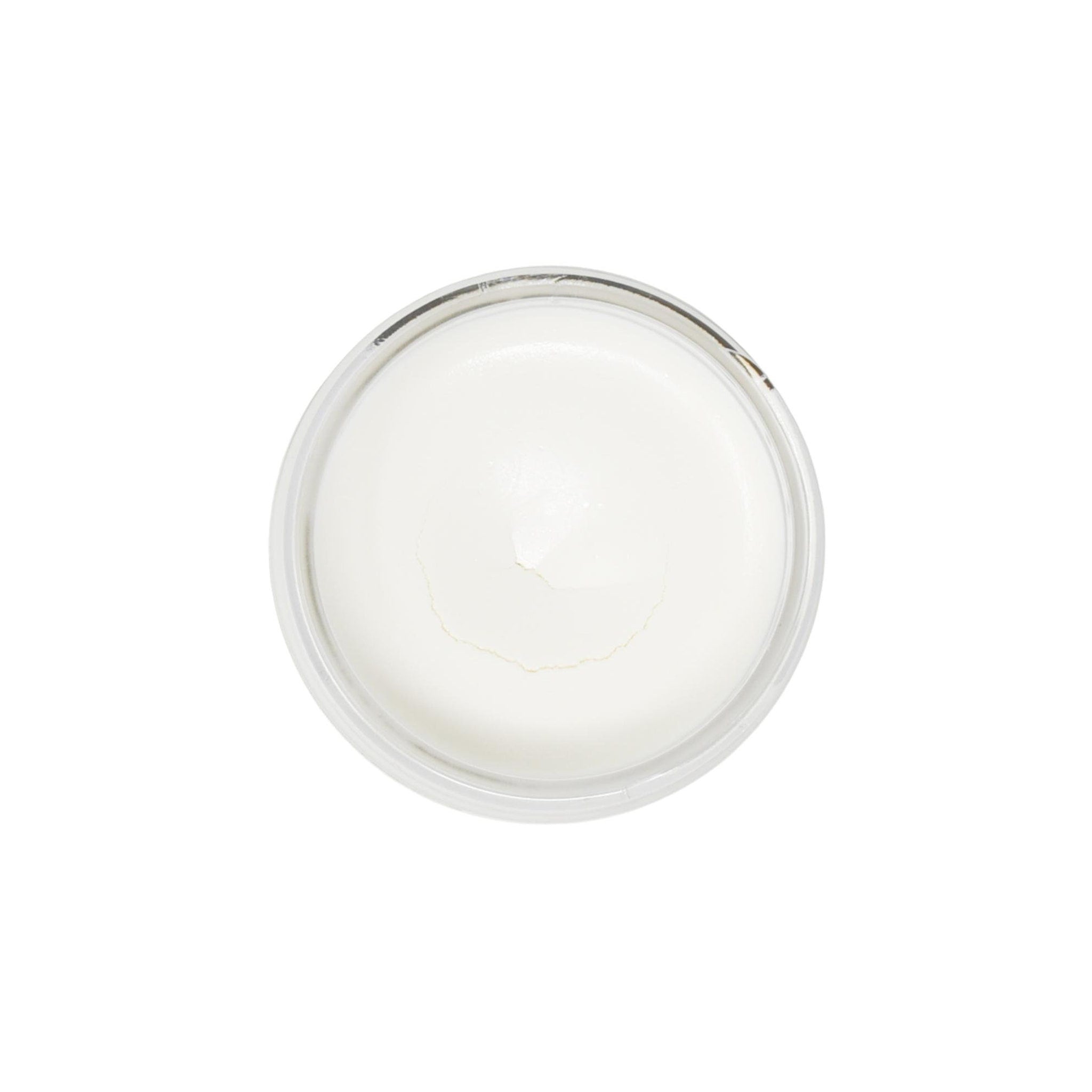White cream in clear plastic container, top view, smooth texture