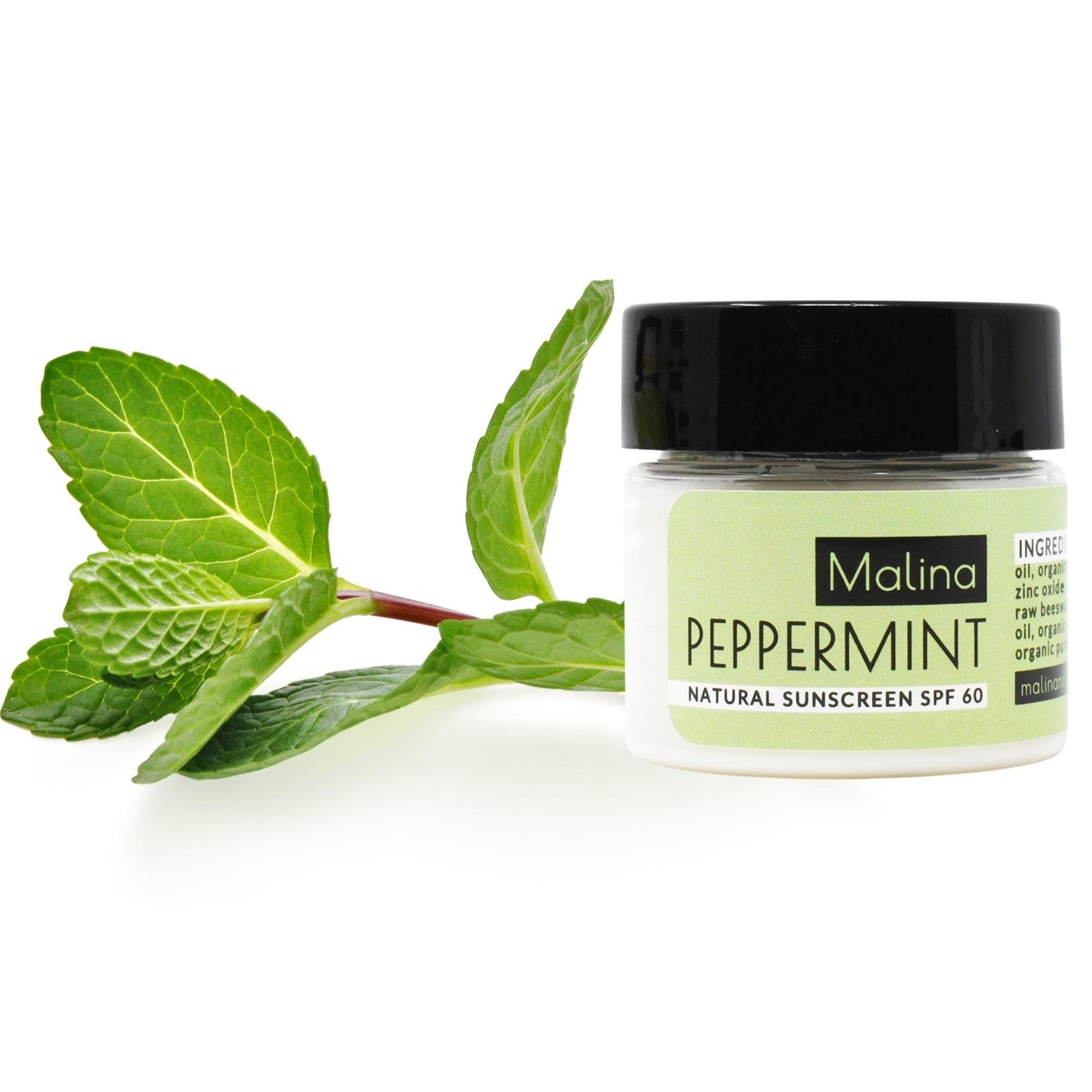 Sunscreen jar with black lid, white bottle, and green label with "Malina Peppermint" text and green leaves