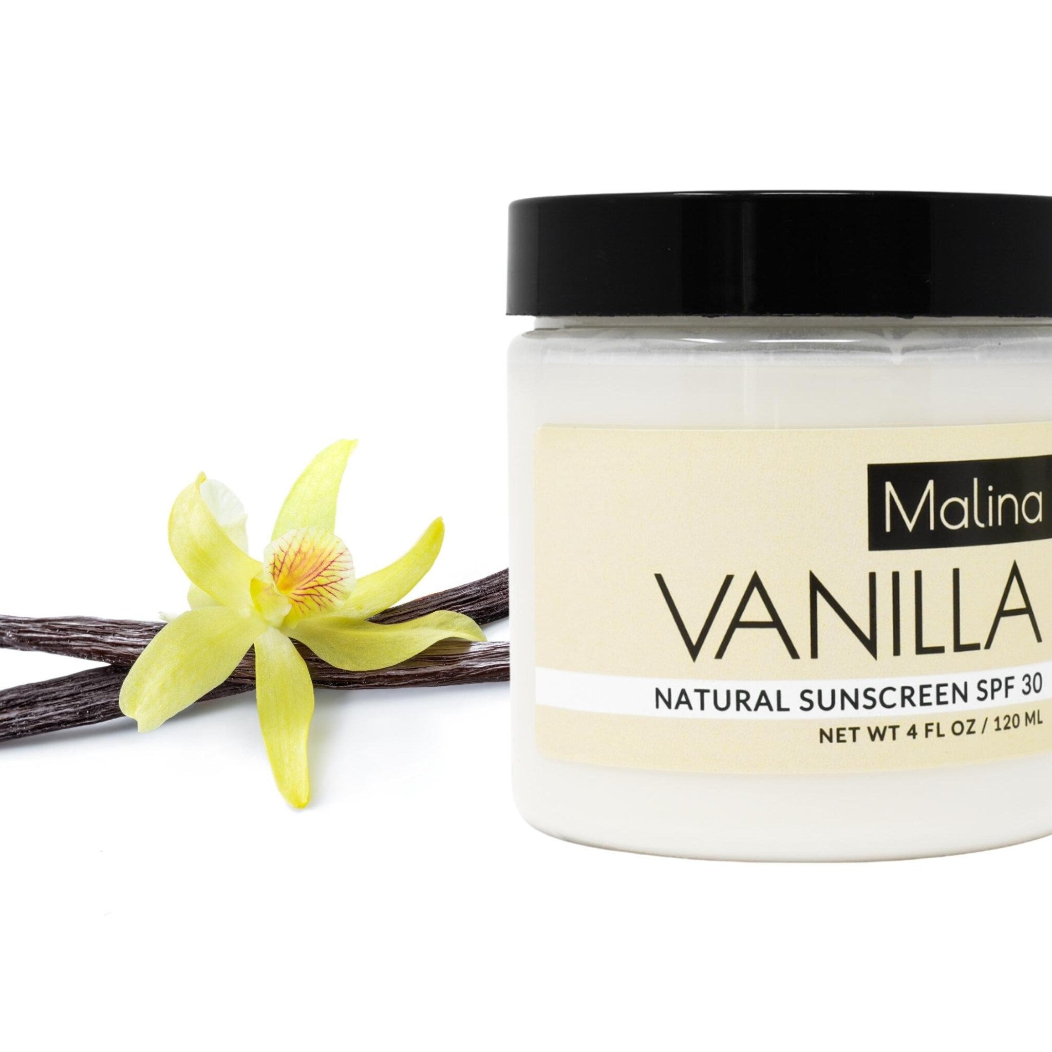Vanilla sunscreen jar with black lid, cream label, and vanilla flower and beans
