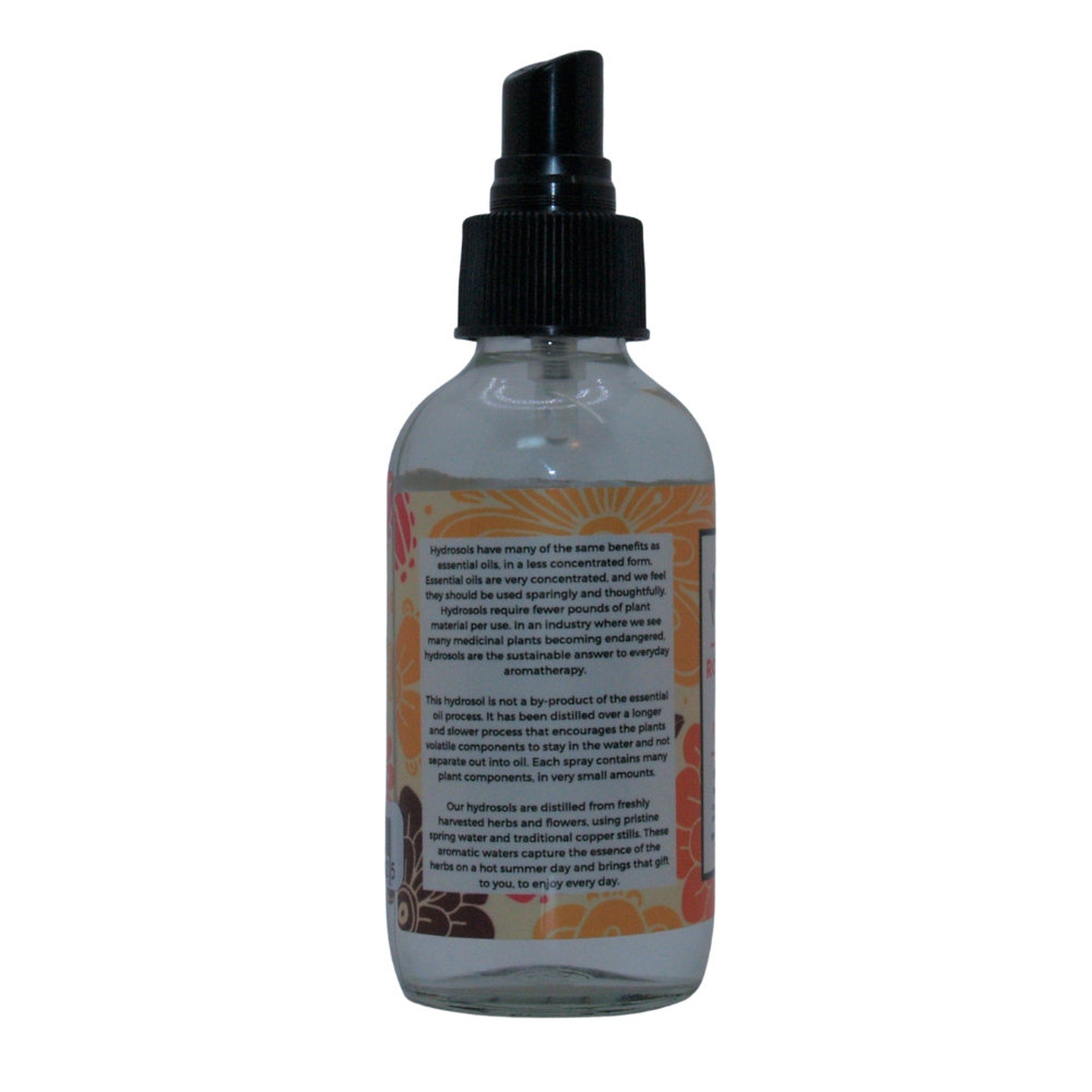 Hydrosol spray bottle with black cap, clear glass, and floral label for aromatherapy