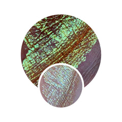 Liquid eyeshadow swatch with green and orange shimmer on skin, Lumichrome product detail