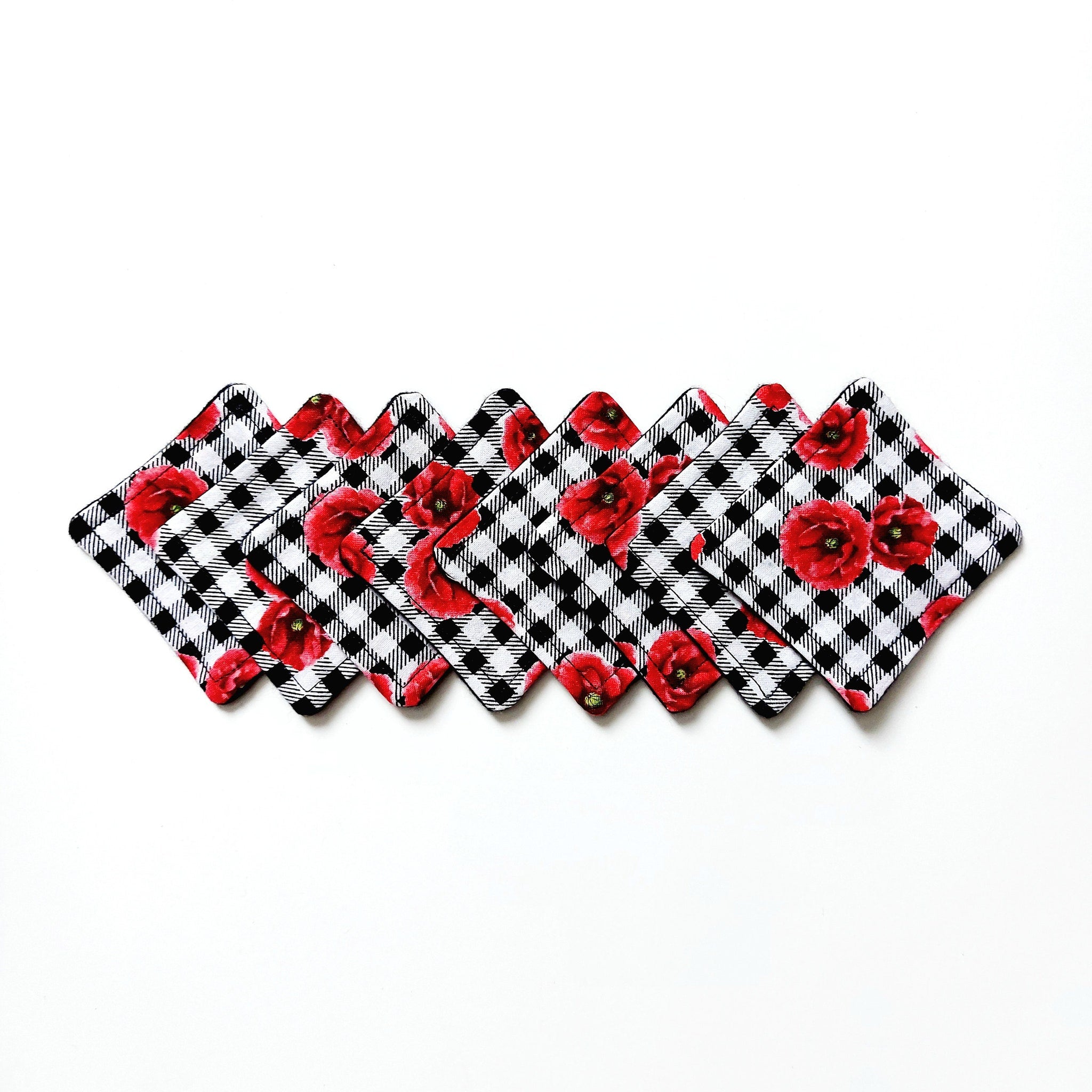 Coasters with red floral pattern and black and white gingham design