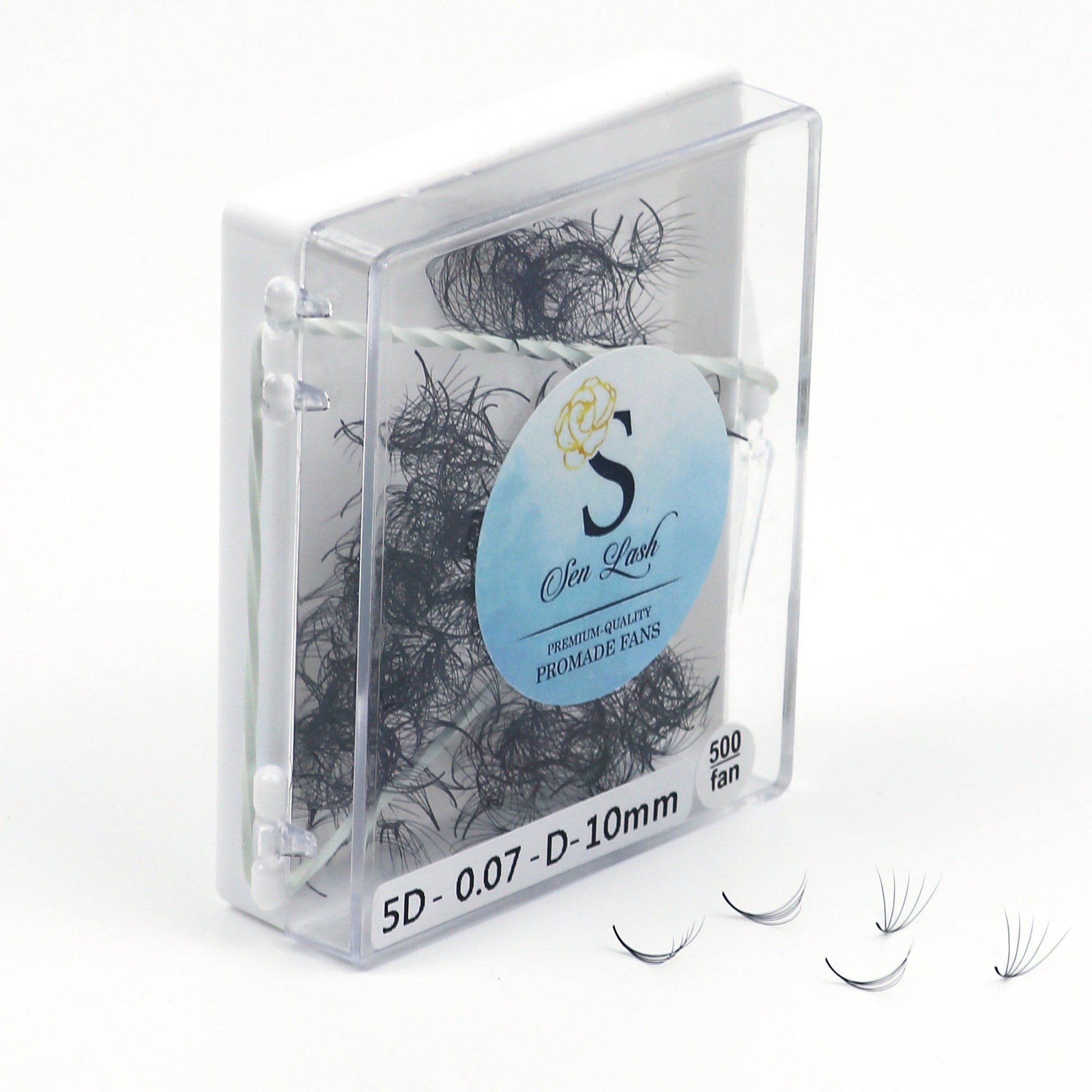 Eyelash extensions in clear case with Sen Lash label, black lashes, and white packaging