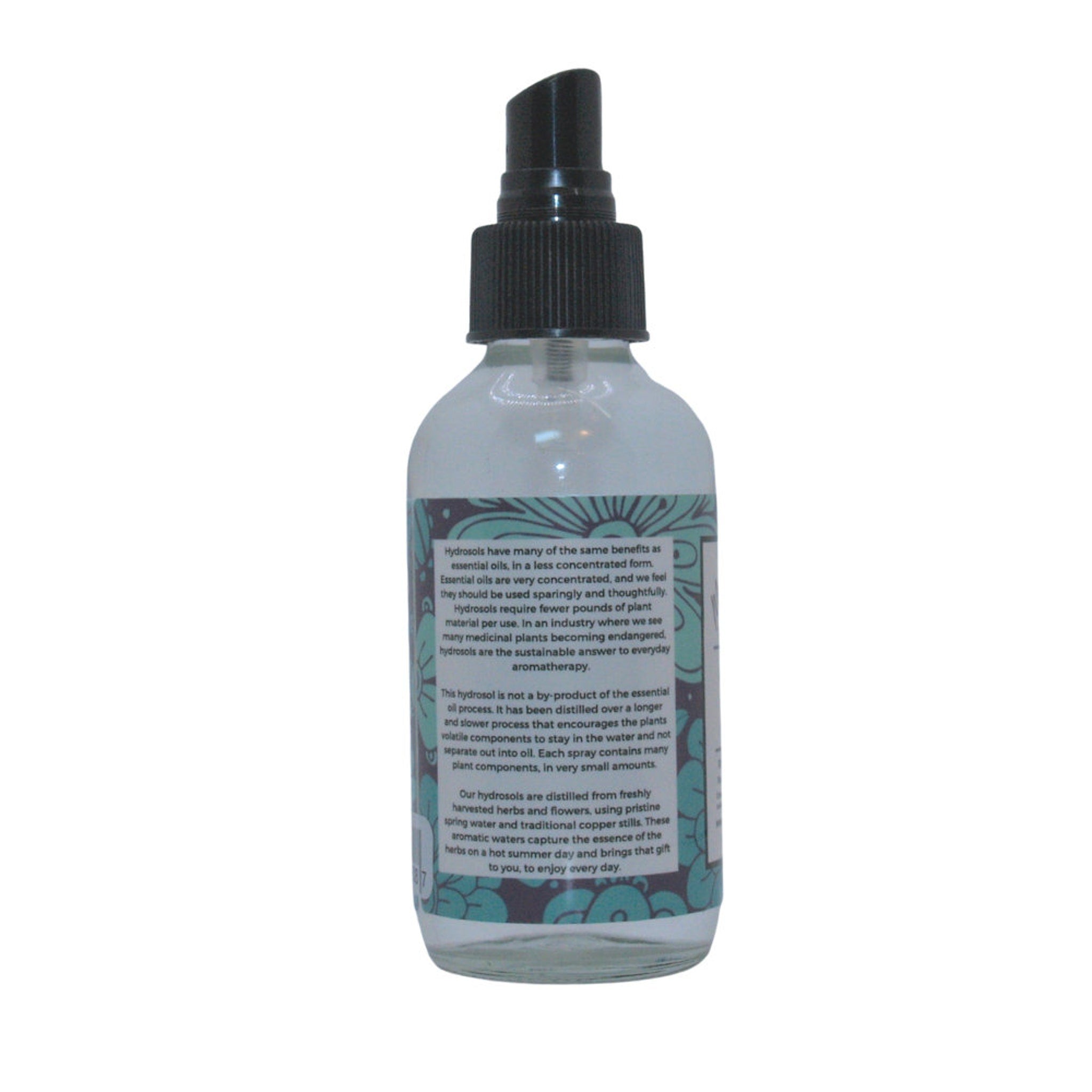 Hydrosol spray bottle with black cap, clear glass, and Mountain Valley Botanics label for aromatherapy