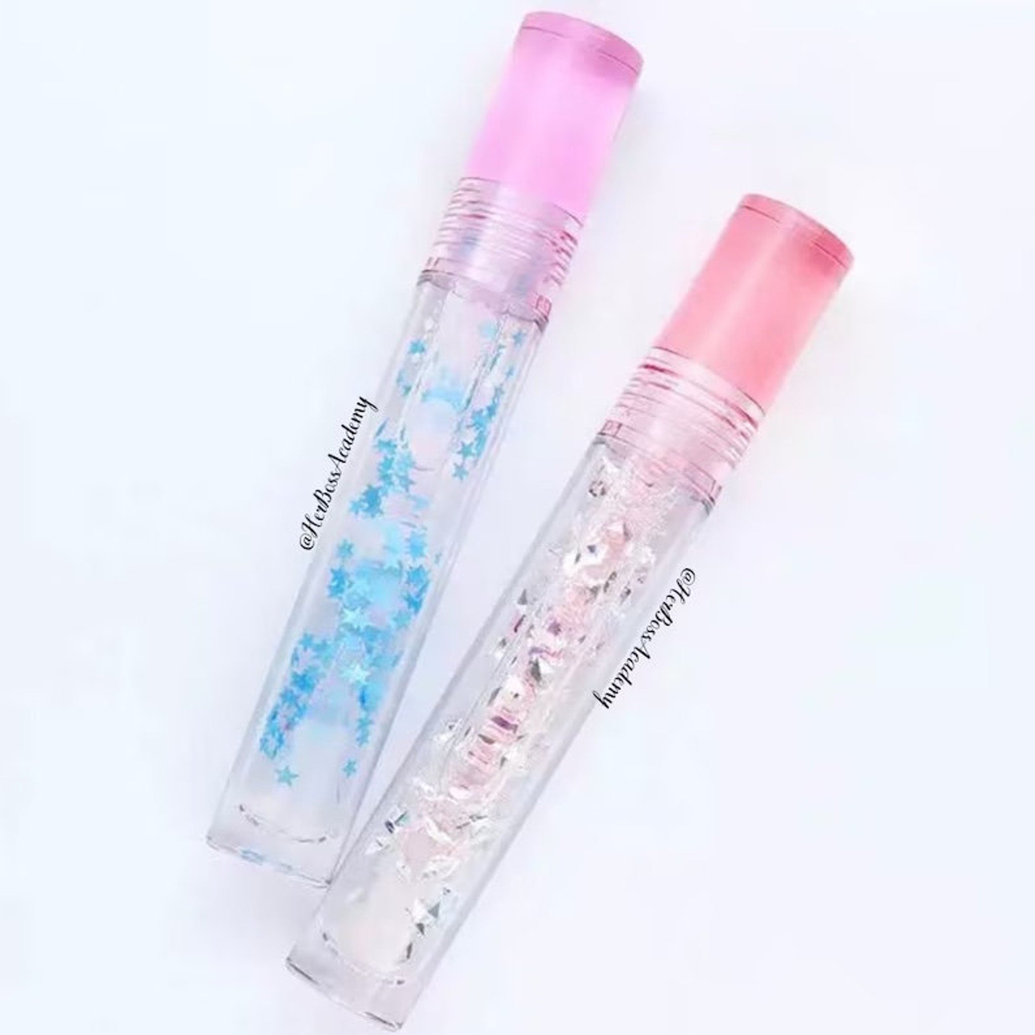 Lip gloss tubes with pink caps, clear tubes, and star-shaped glitter inside.