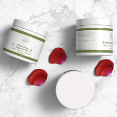 Sugar scrub jars, white and green label, with red rose petals, Victoria Naturals branding visible