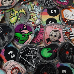 Reusable face wipes with various colorful horror character patterns and stitched edges