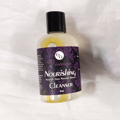 Cleanser bottle with black cap, purple label, and clear liquid, Vronique brand visible