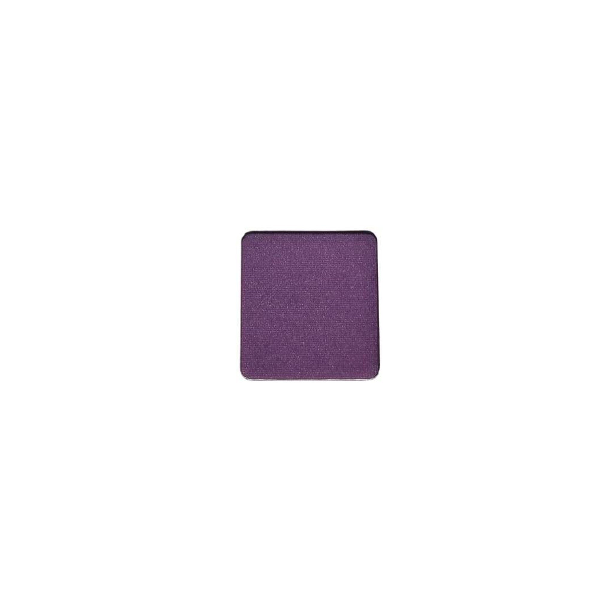 Side view of refillable vegan eyeshadow pans displaying earthy countryside shades in compact circular packaging