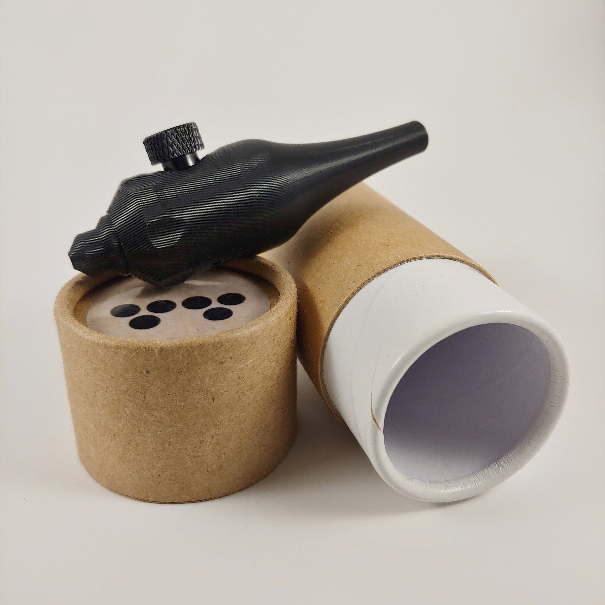 Silver 25mm handpoke skincare tool angled to showcase precision tip for gentle facial treatments