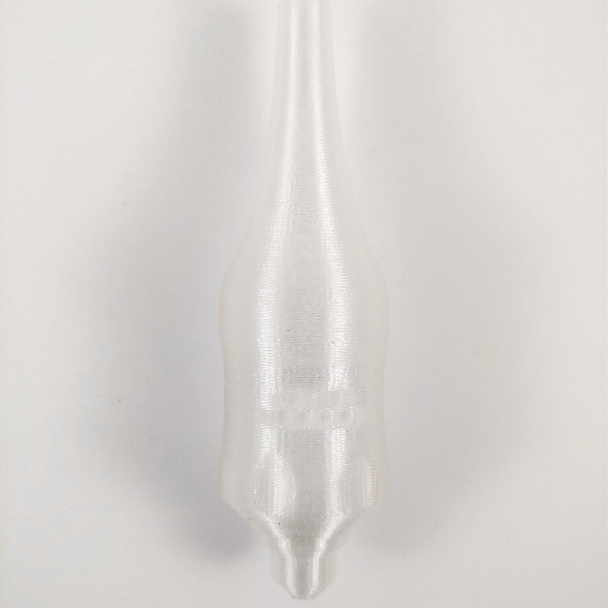 Close-up side view of 25mm handpoke skincare tool with smooth stainless steel tip for gentle facial treatments