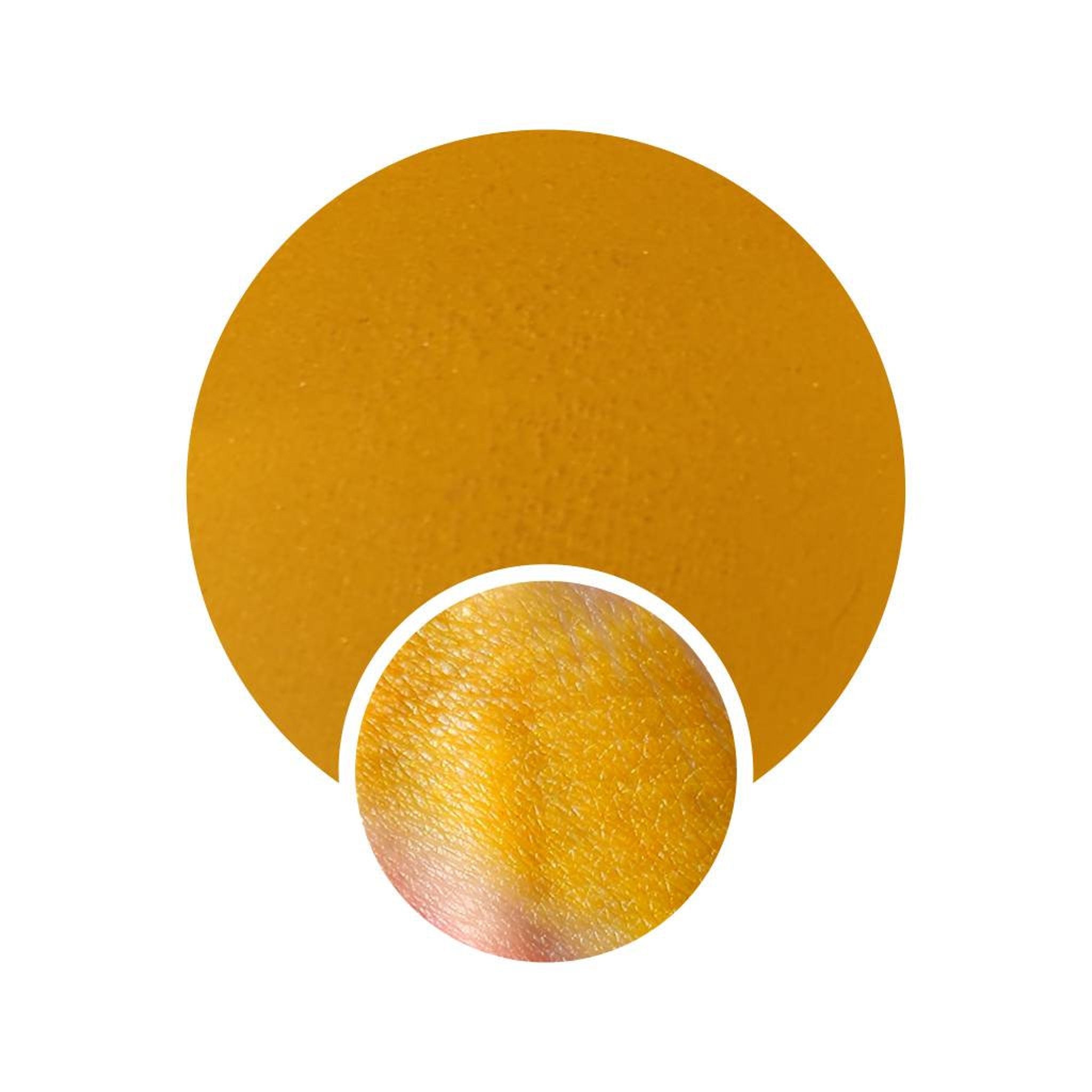 Close-up of vibrant neon yellow matte eyeshadow in a round pressed pan with 80s retro packaging