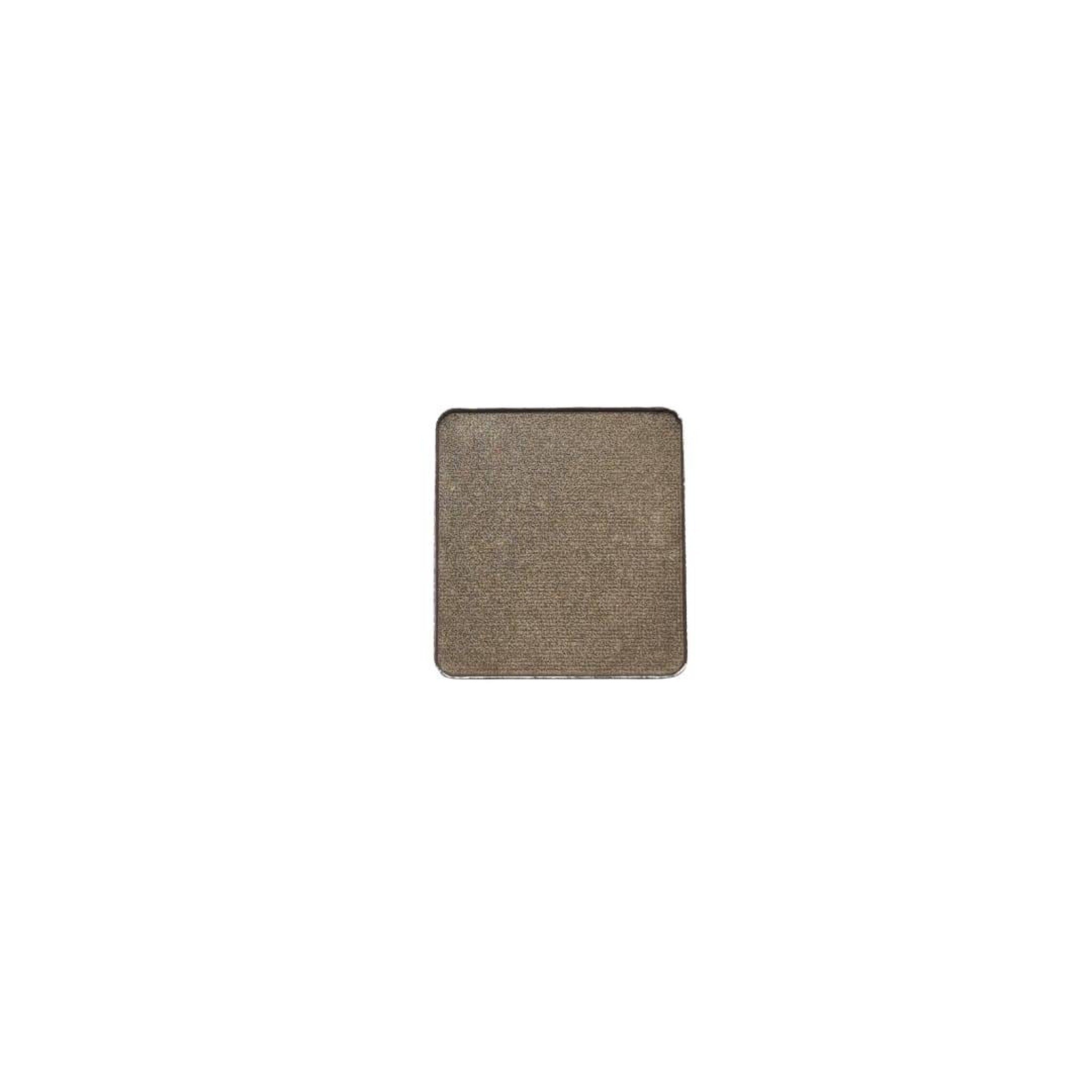 Stacked vegan eyeshadow pans in earthy tones with refillable magnetic compact