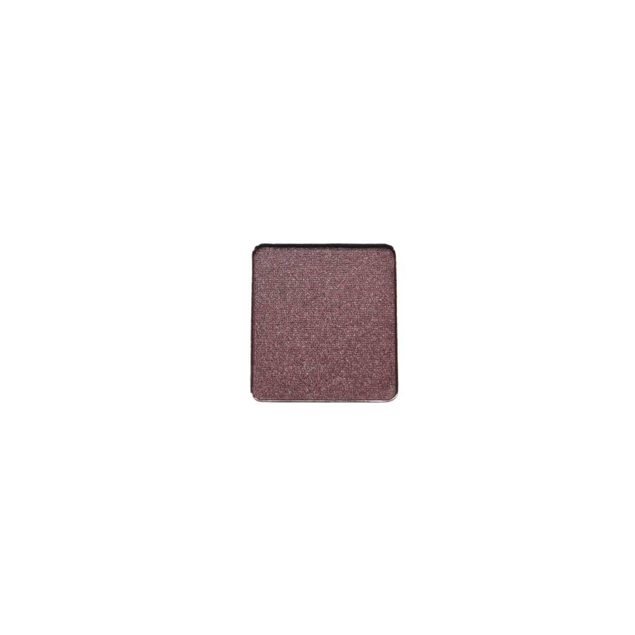 Close-up of refillable vegan eyeshadow pans showing matte taupe and soft mauve countryside shades in compact palette