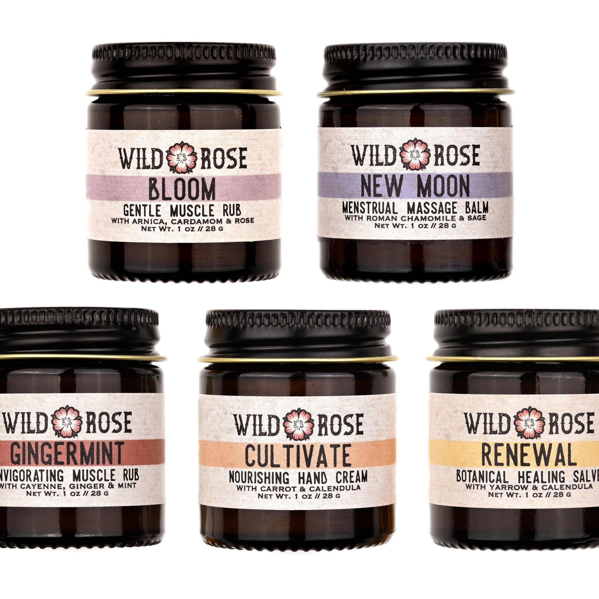 Muscle rub jars with black lids, Wild Rose brand labels, and color-coded bands