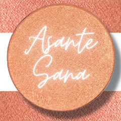 Close-up of pressed vegan eyeshadow pan showing smooth matte texture in rich pigment