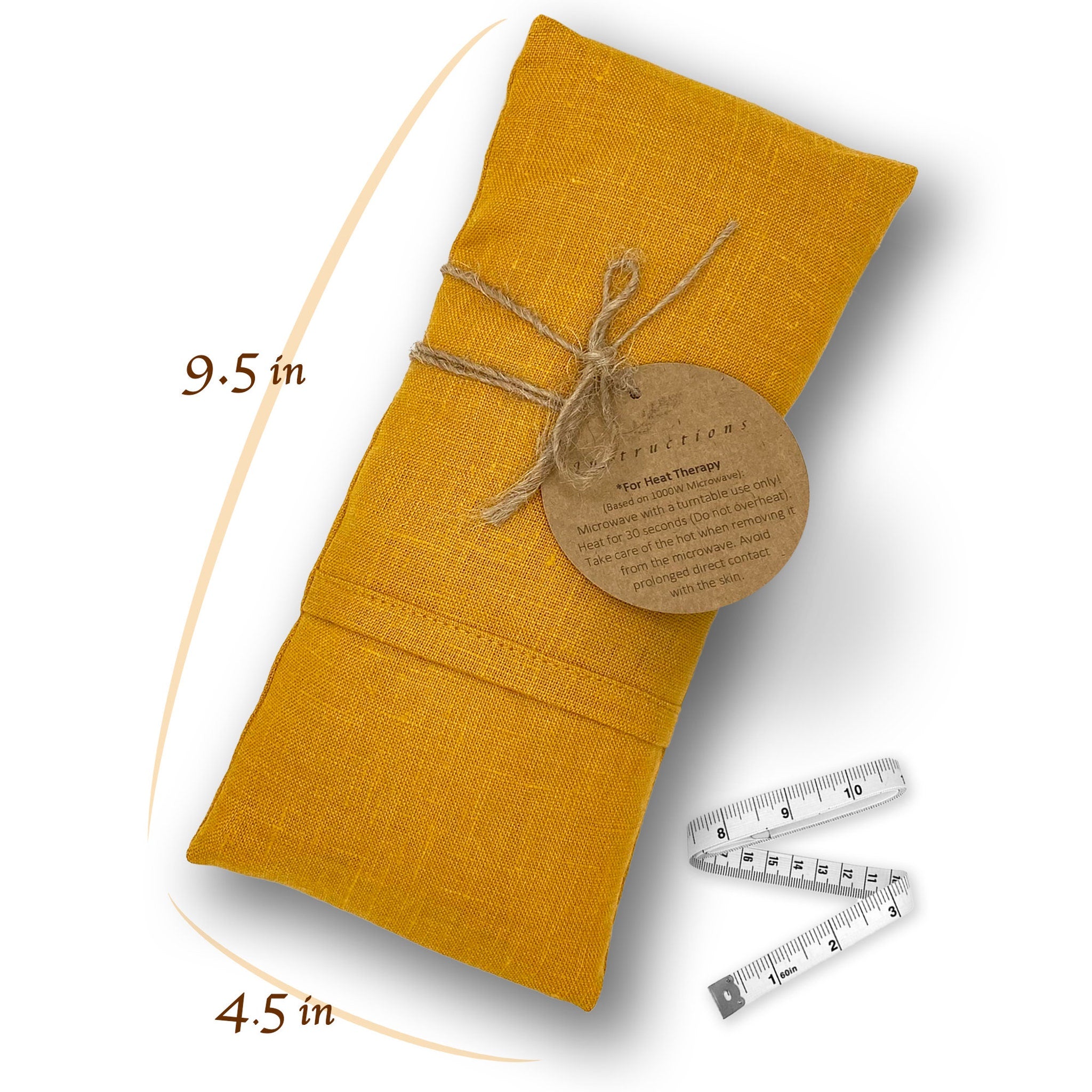 Mustard yellow linen heat pack tied with twine, with instructions tag and measuring tape