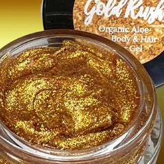 Gold glitter gel in a clear squeeze tube with metallic gold cap, showcasing shimmering vegan eye shadow