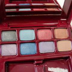 Close-up of Avon Ultra Wear Eye Shadow palette showing four vibrant powder shades with smooth, blendable texture