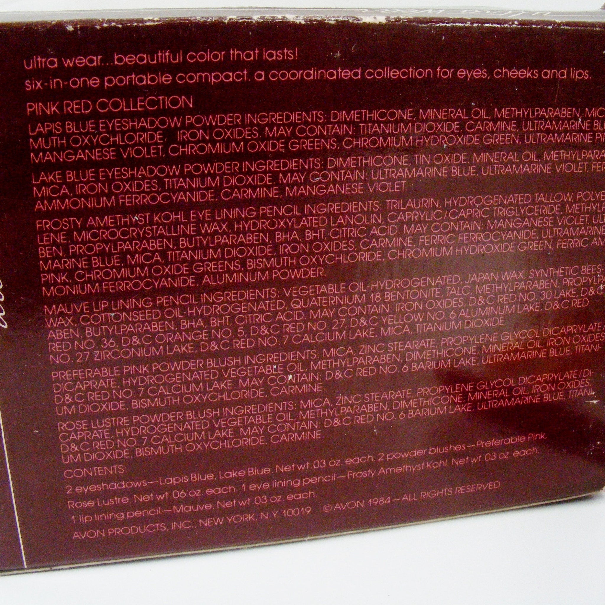 Side view of Avon Ultra Wear Eye Shadow palette showing stacked multi-shade pans with satin finish