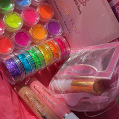 Hand applying iridescent teal glitter shadow with fingertip onto eyelid, neon palette open beside mirror