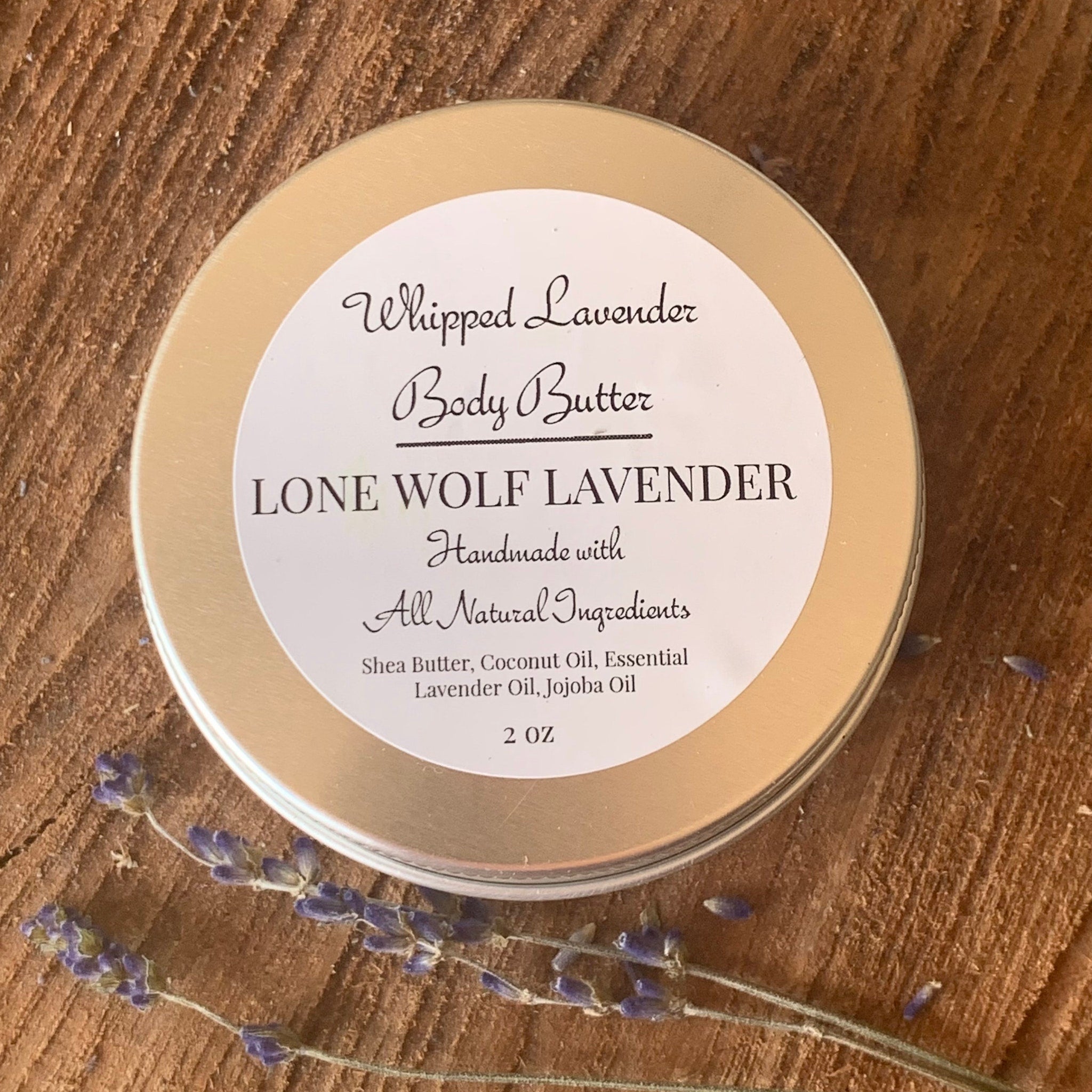 Lavender whipped body butter in a sleek white jar with gold lid, shown on wet skin for deep hydration