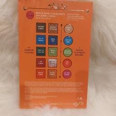 Eyeshadow palette with orange, brown, and blue shades, J.Cat Beauty brand